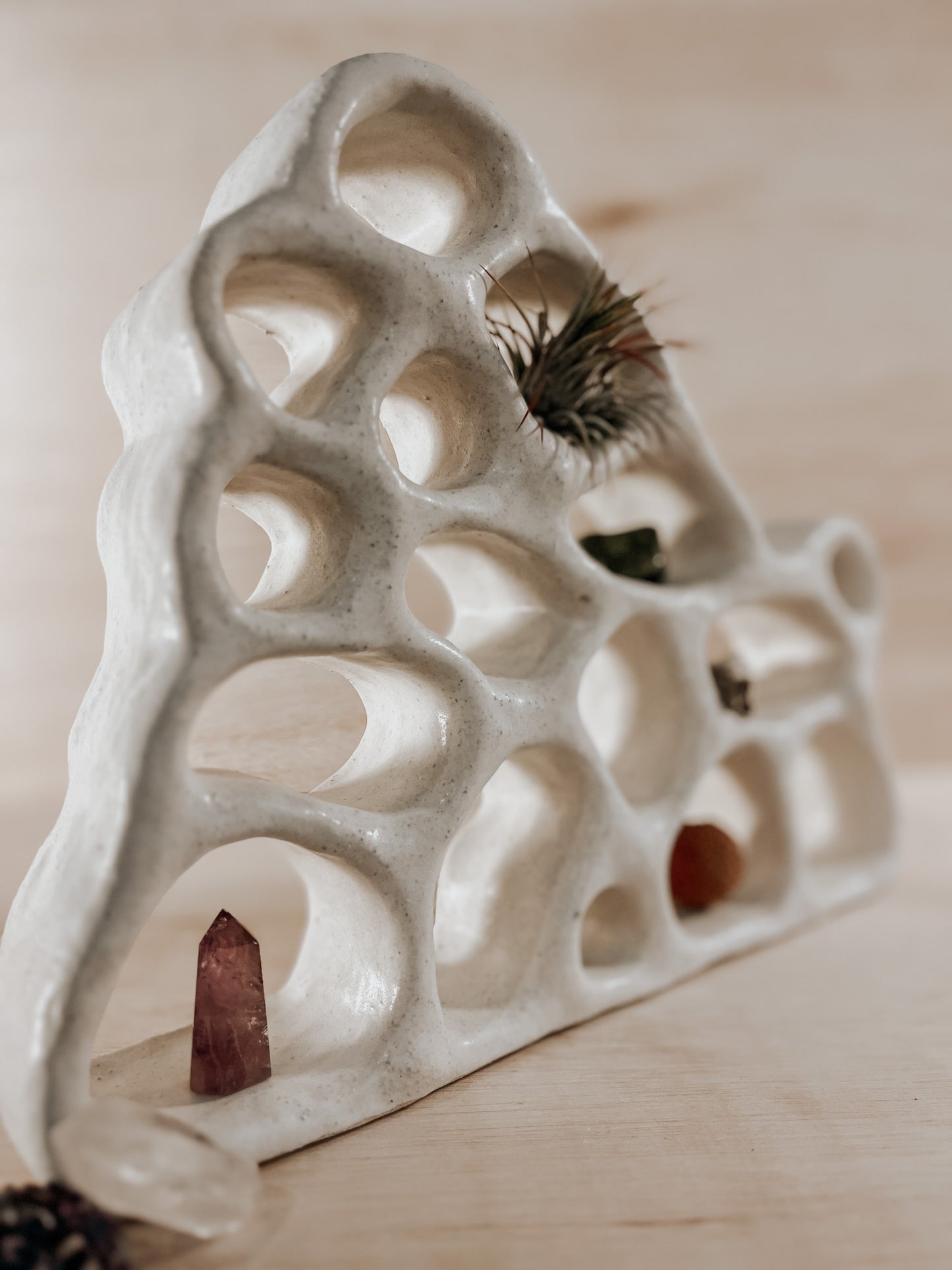 Hand-built ceramic altar with matte glaze, wall-mounted, soft curves, handmade in Boulder