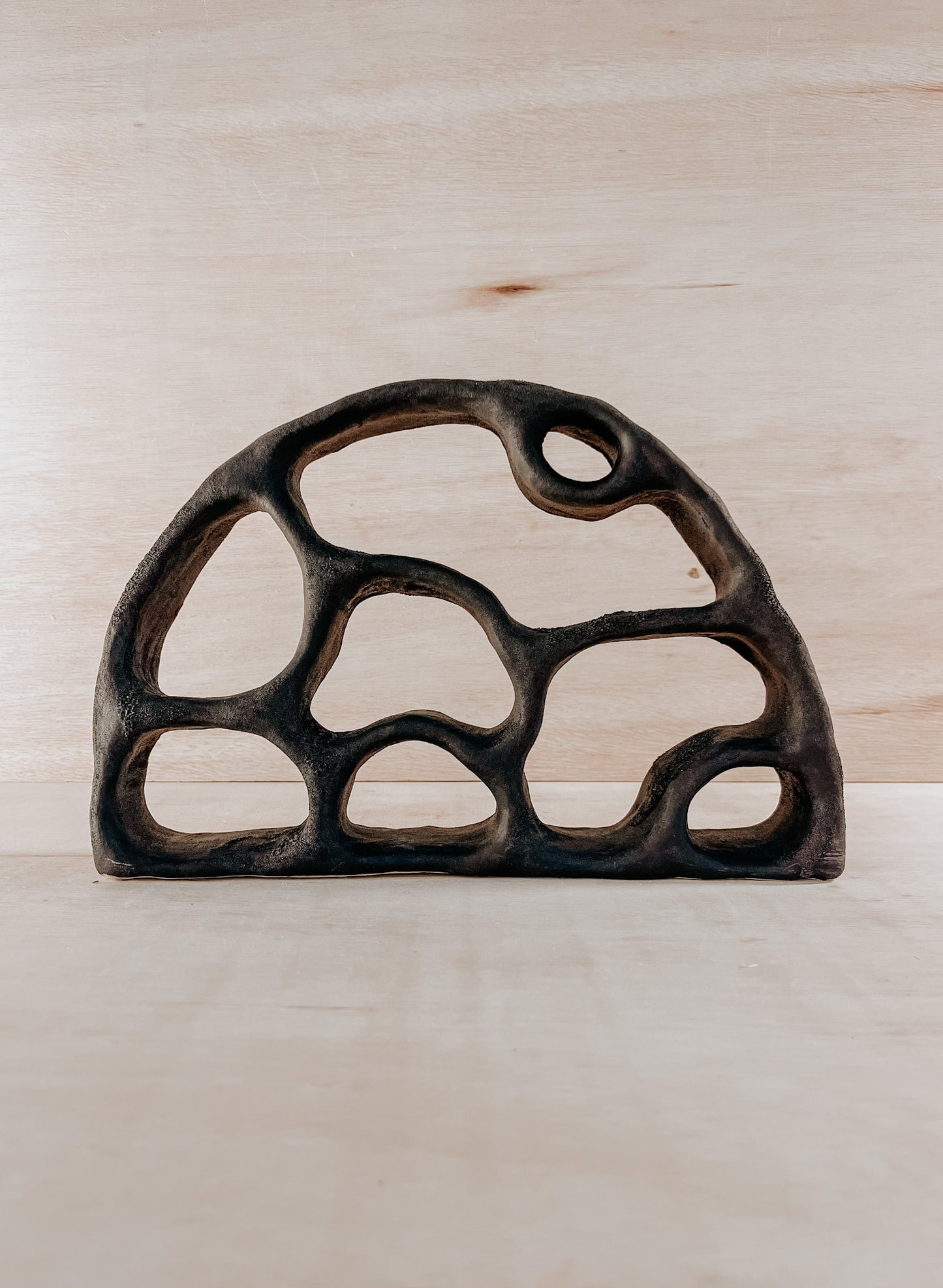 Hand-built ceramic altar with matte glaze, wall-mounted, soft curves, handmade in Boulder