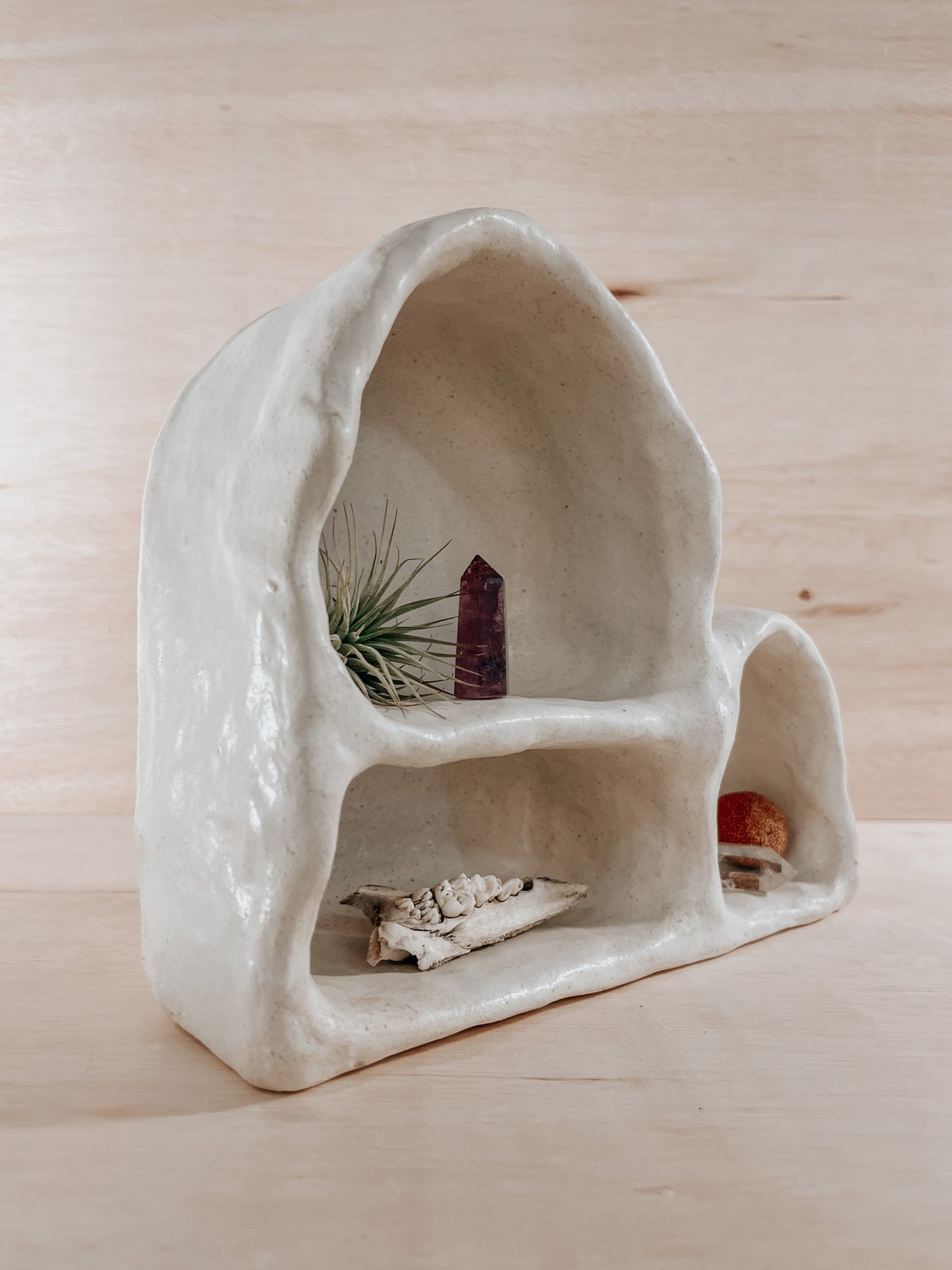 Hand-built ceramic altar with matte glaze, wall-mounted, soft curves, handmade in Boulder