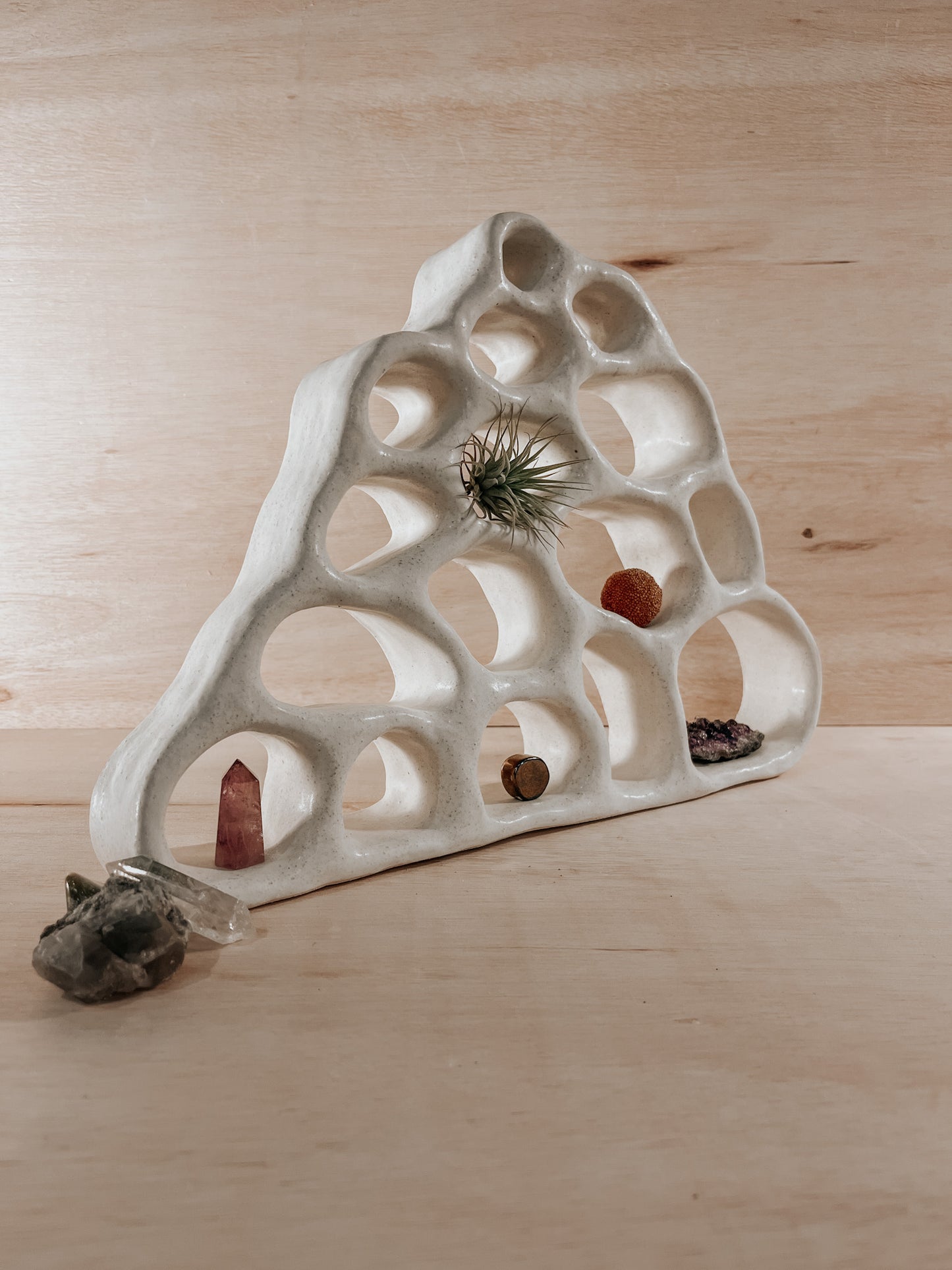 Hand-built ceramic altar with matte glaze, wall-mounted, soft curves, handmade in Boulder