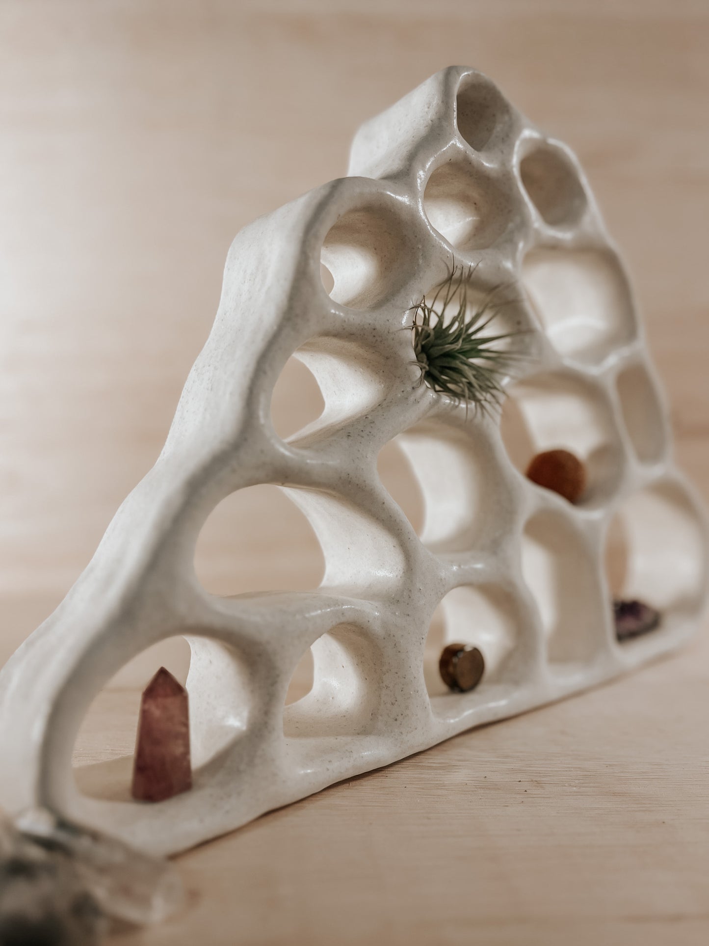 Hand-built ceramic altar with matte glaze, wall-mounted, soft curves, handmade in Boulder