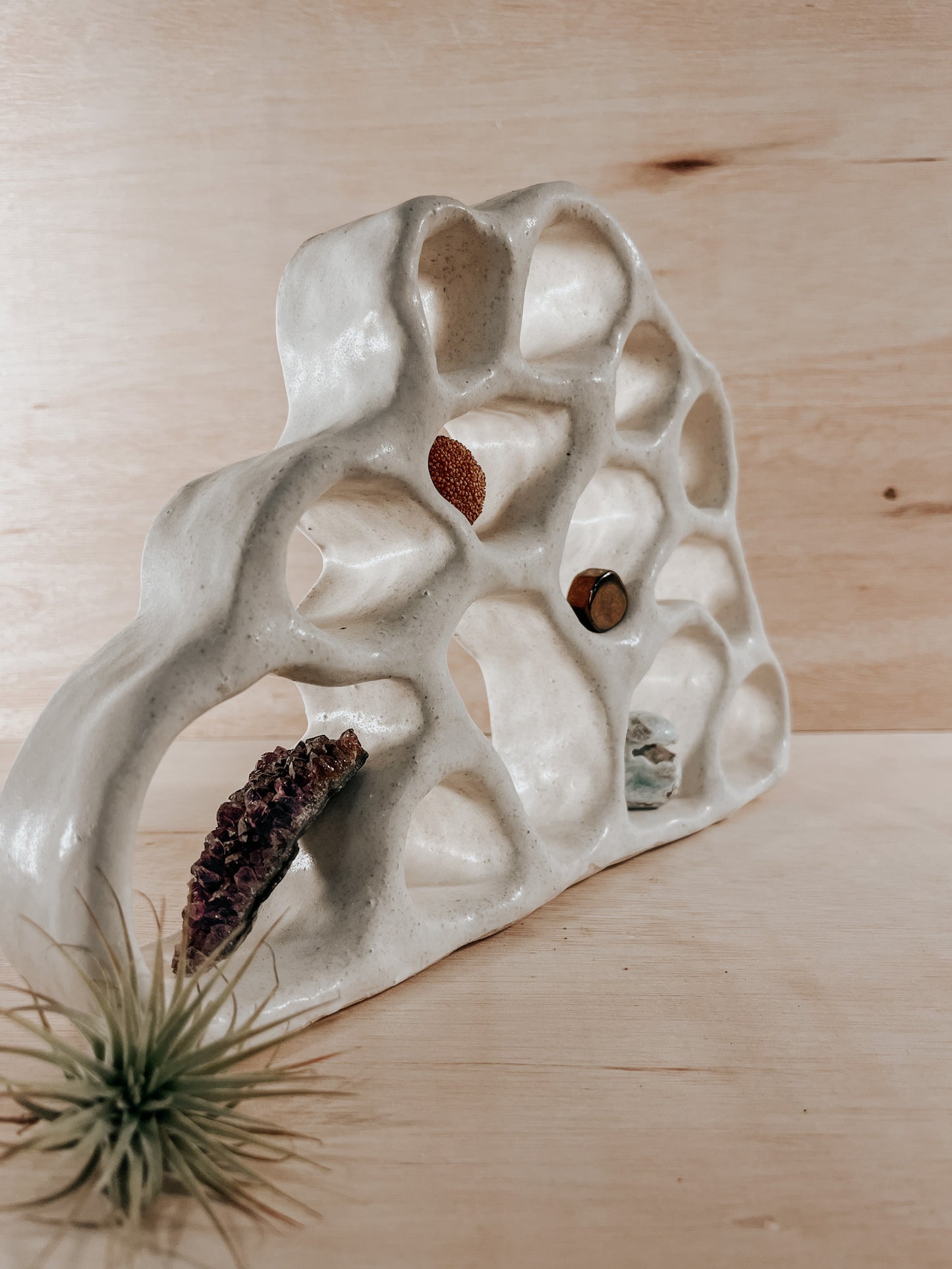 Hand-built ceramic altar with matte glaze, wall-mounted, soft curves, handmade in Boulder