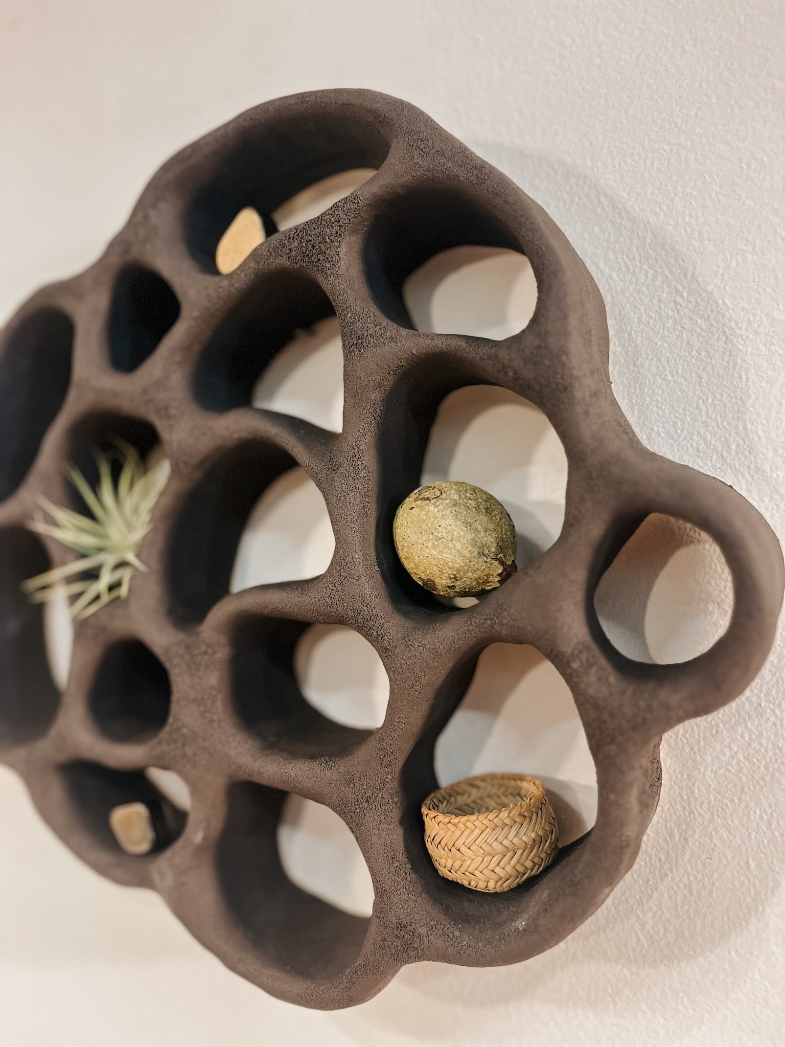 Hand-built ceramic altar with matte glaze, wall-mounted, soft curves, handmade in Boulder