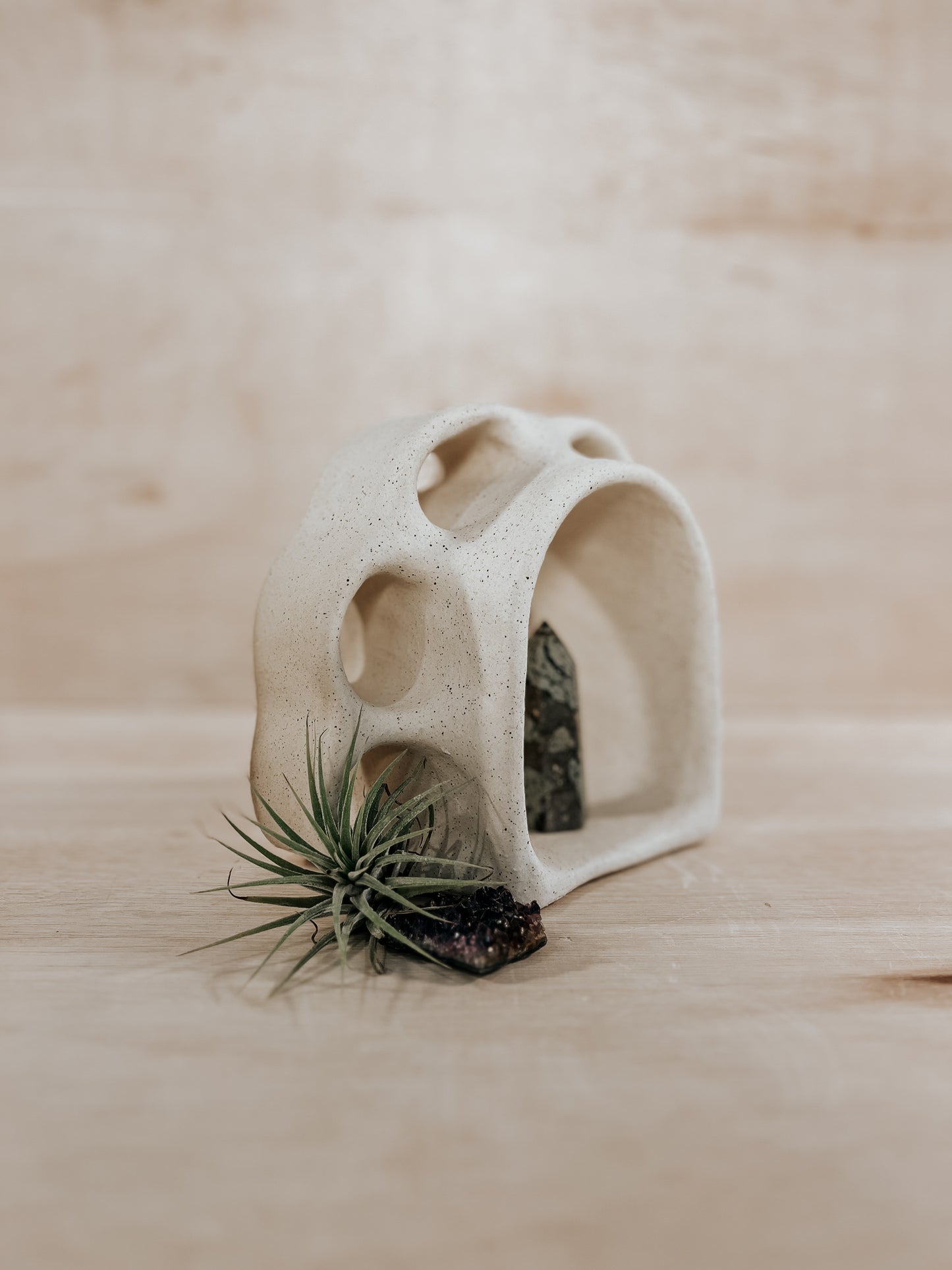 Hand-built ceramic altar with matte glaze, wall-mounted, soft curves, handmade in Boulder