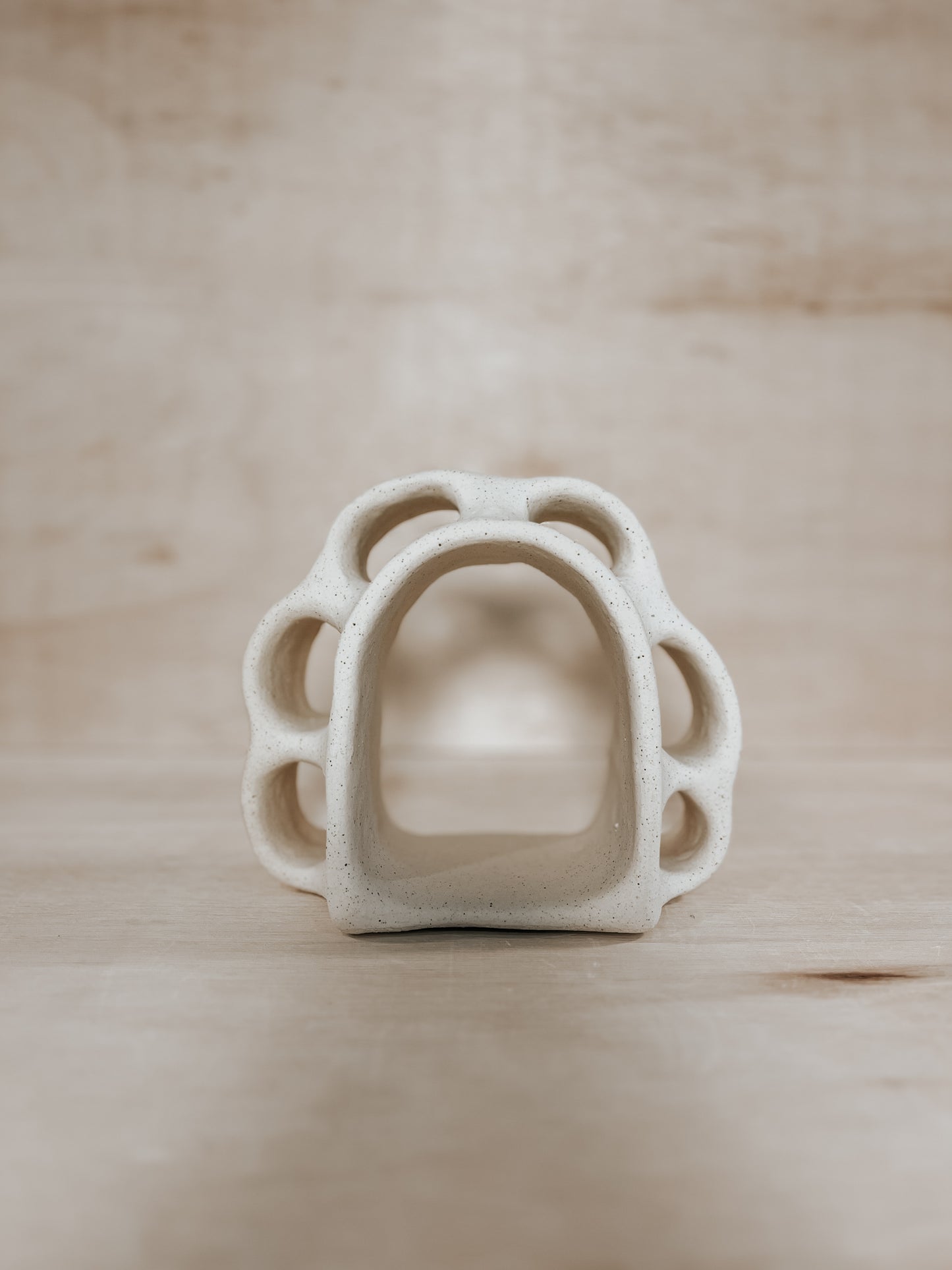Hand-built ceramic altar with matte glaze, wall-mounted, soft curves, handmade in Boulder
