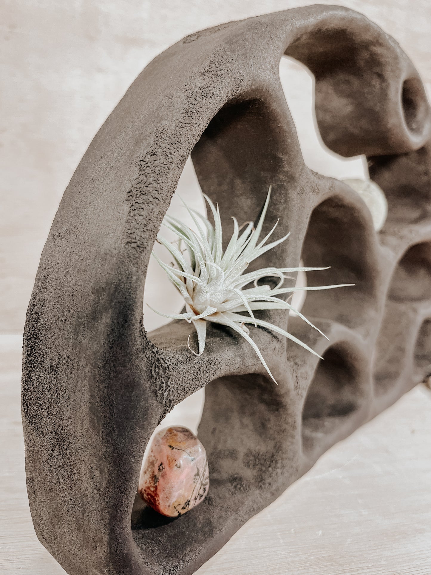 Hand-built ceramic altar with matte glaze, wall-mounted, soft curves, handmade in Boulder