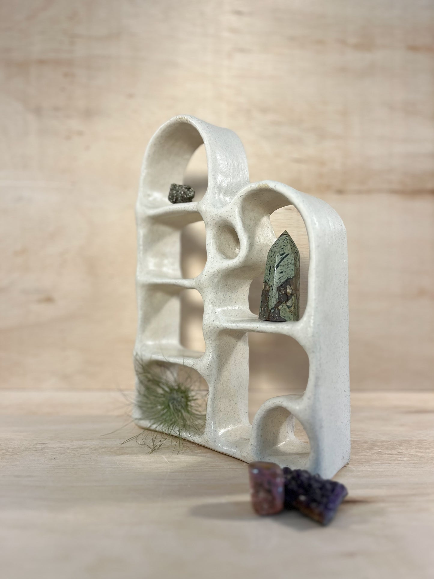 Hand-built ceramic altar with matte glaze, wall-mounted, soft curves, handmade in Boulder
