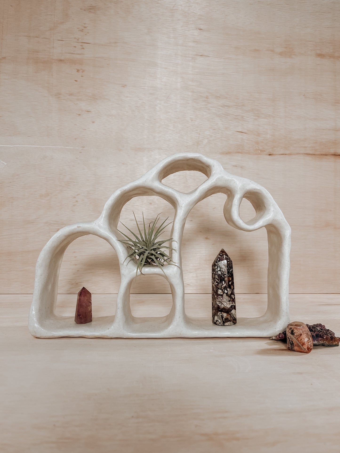 Hand-built ceramic altar with matte glaze, wall-mounted, soft curves, handmade in Boulder