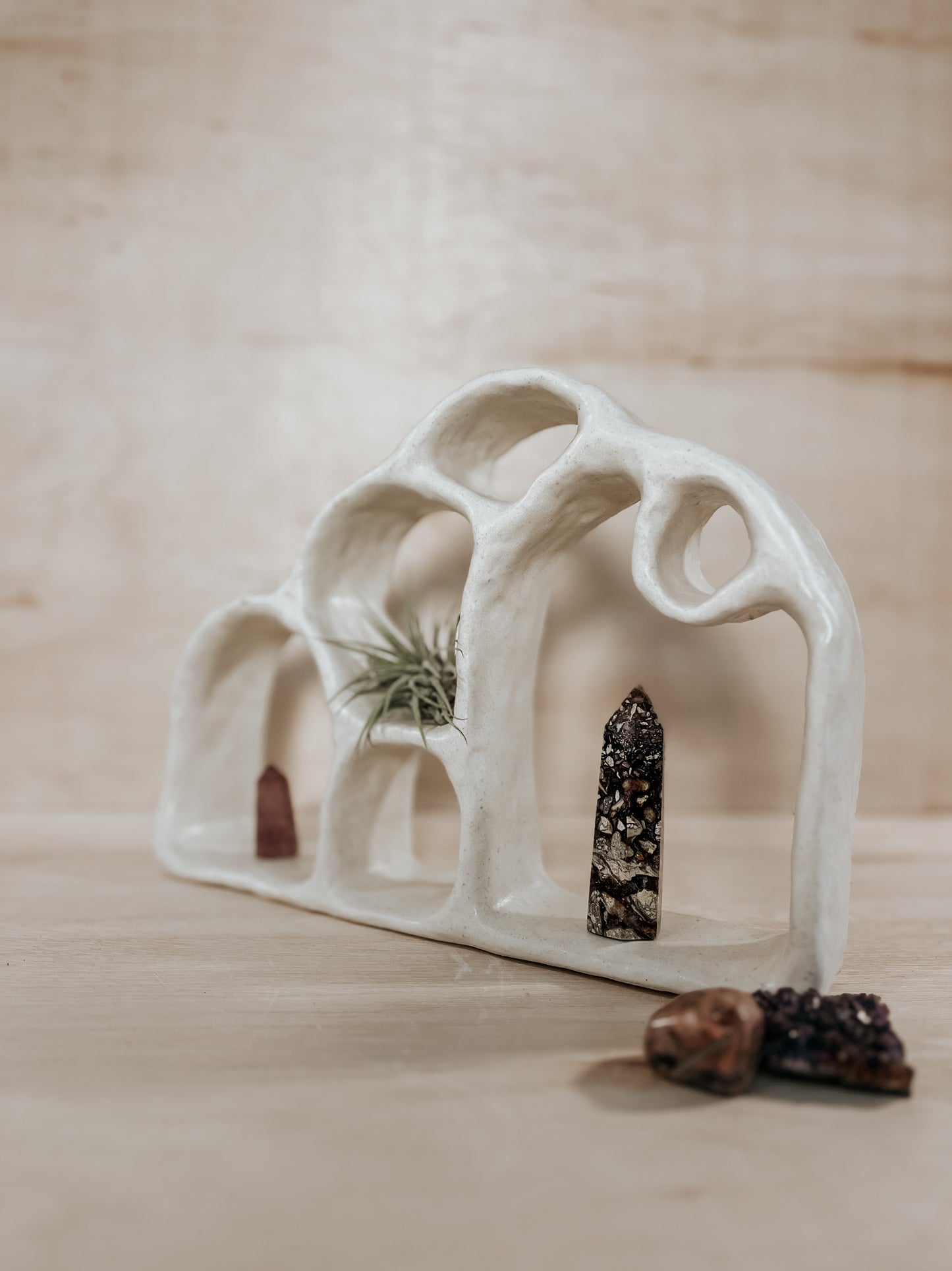 Hand-built ceramic altar with matte glaze, wall-mounted, soft curves, handmade in Boulder