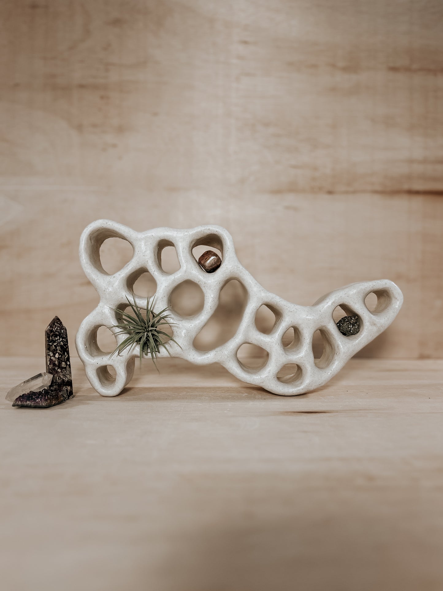 Hand-built ceramic altar with matte glaze, wall-mounted, soft curves, handmade in Boulder