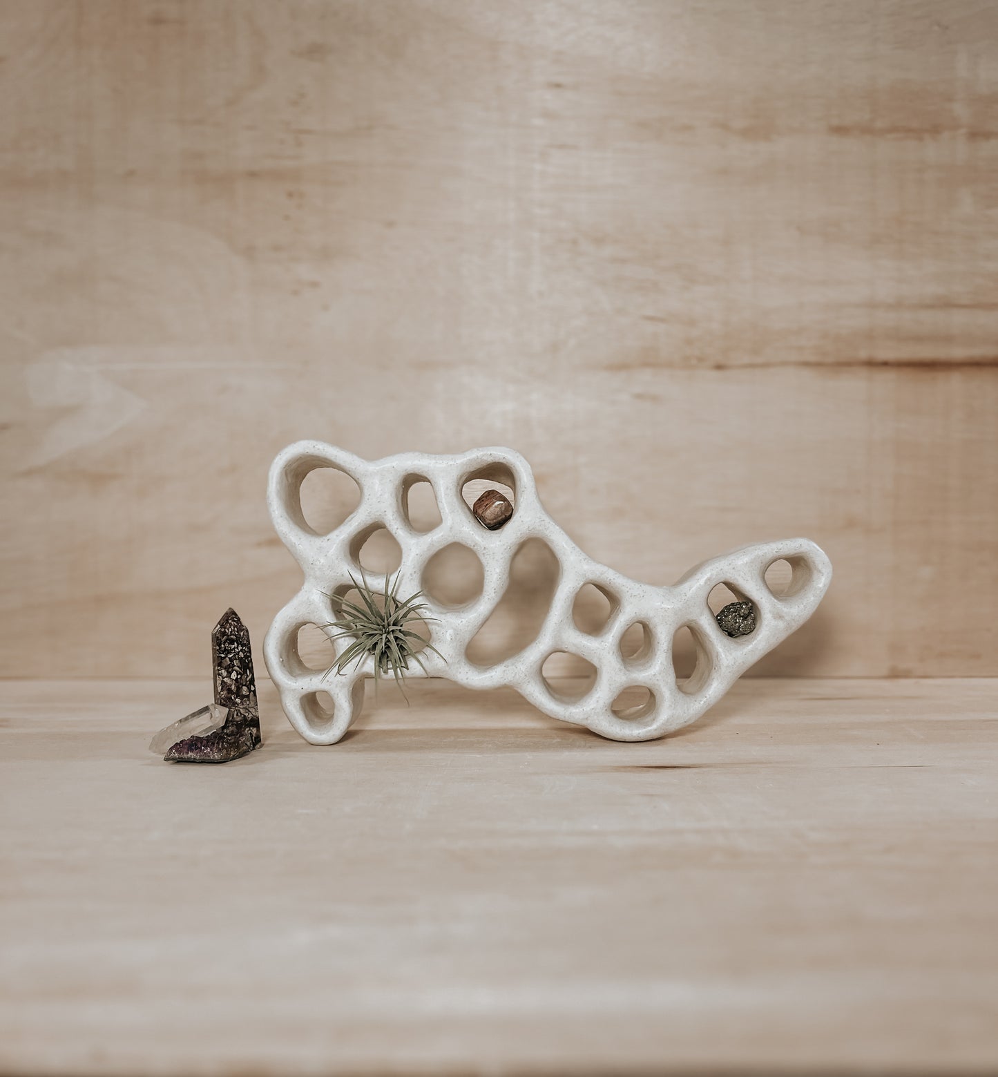 Hand-built ceramic altar with matte glaze, wall-mounted, soft curves, handmade in Boulder