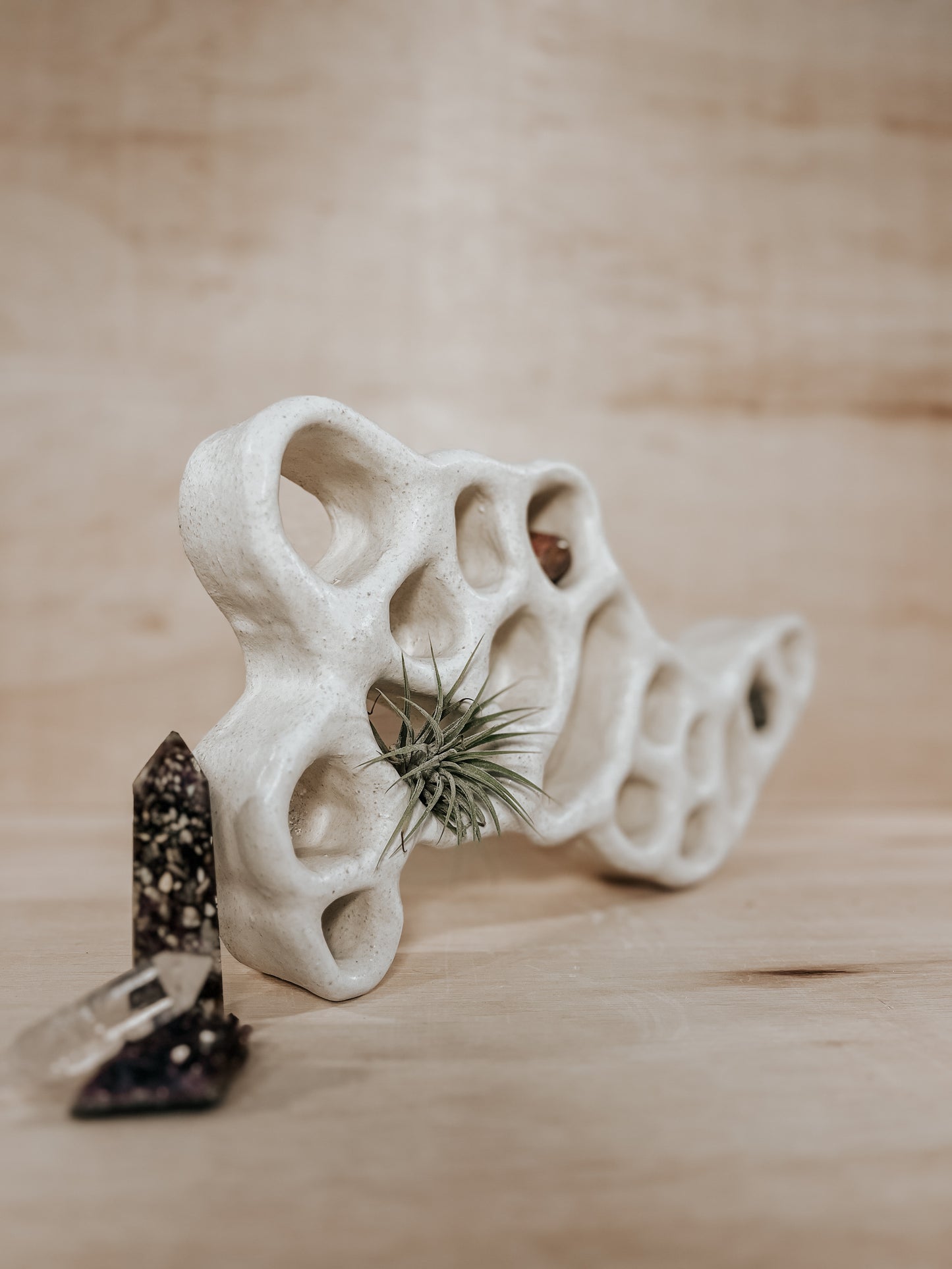 Hand-built ceramic altar with matte glaze, wall-mounted, soft curves, handmade in Boulder