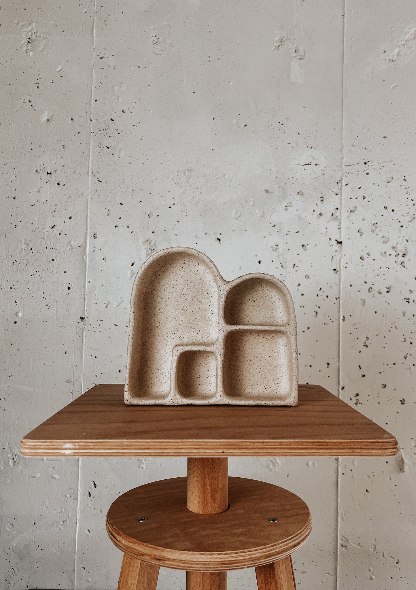 Handmade ceramic altar with matte glaze, sculptural wall-mounted design, ideal for rituals or meditation, crafted in Boulder, CO