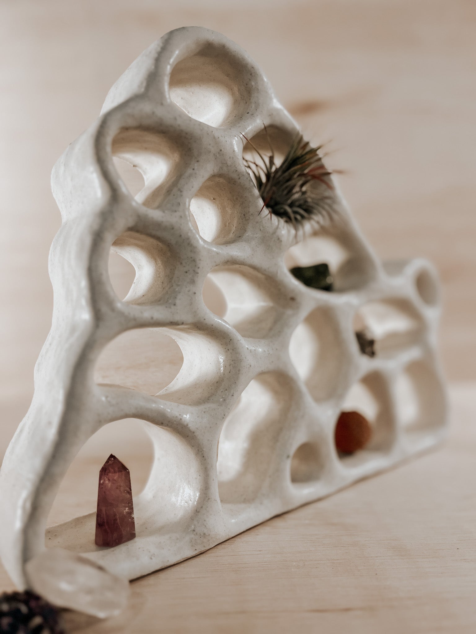 Hand-built ceramic altar with matte glaze, wall-mounted, soft curves, handmade in Boulder