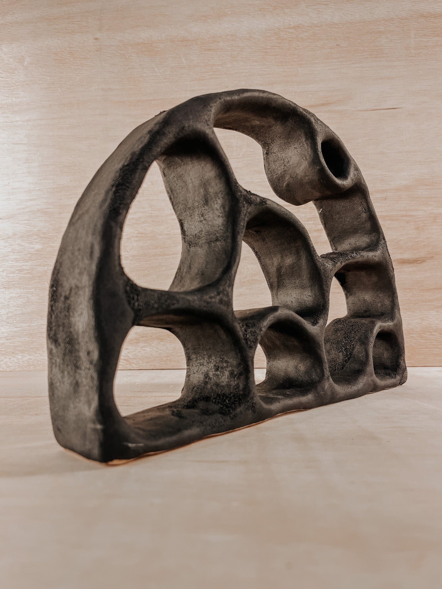 Hand-built ceramic altar with matte glaze, wall-mounted, soft curves, handmade in Boulder
