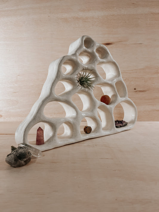 Hand-built ceramic altar with matte glaze, wall-mounted, soft curves, handmade in Boulder