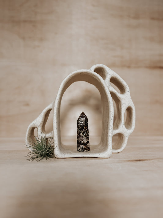 Hand-built ceramic altar with matte glaze, wall-mounted, soft curves, handmade in Boulder