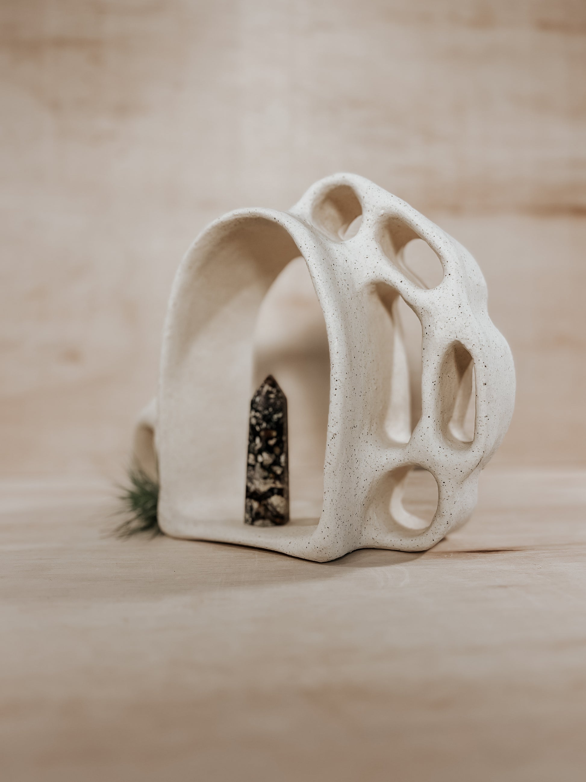 Hand-built ceramic altar with matte glaze, wall-mounted, soft curves, handmade in Boulder