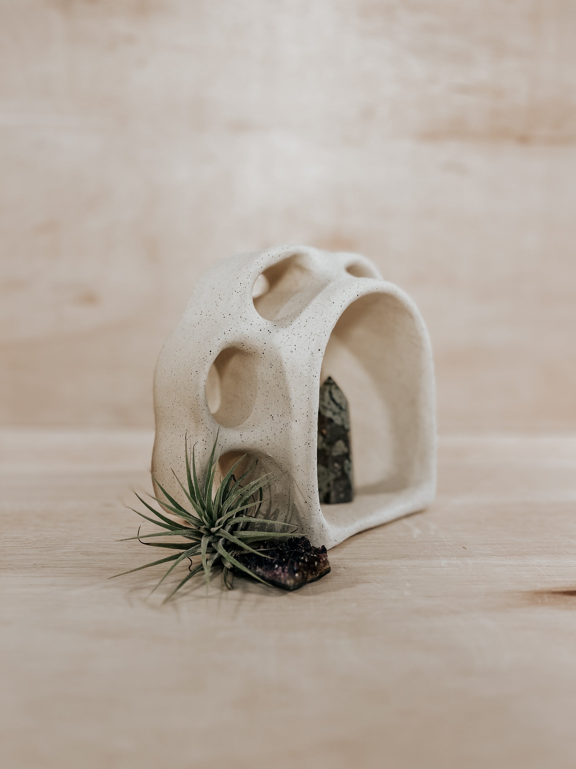 Hand-built ceramic altar with matte glaze, wall-mounted, soft curves, handmade in Boulder