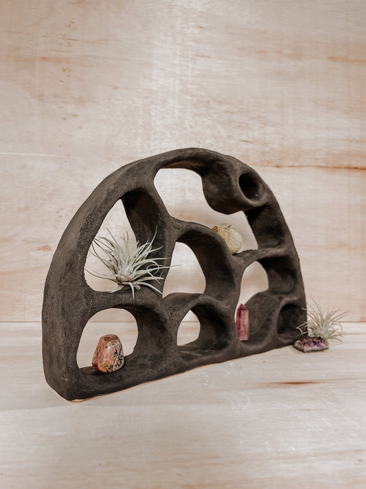 Hand-built ceramic altar with matte glaze, wall-mounted, soft curves, handmade in Boulder