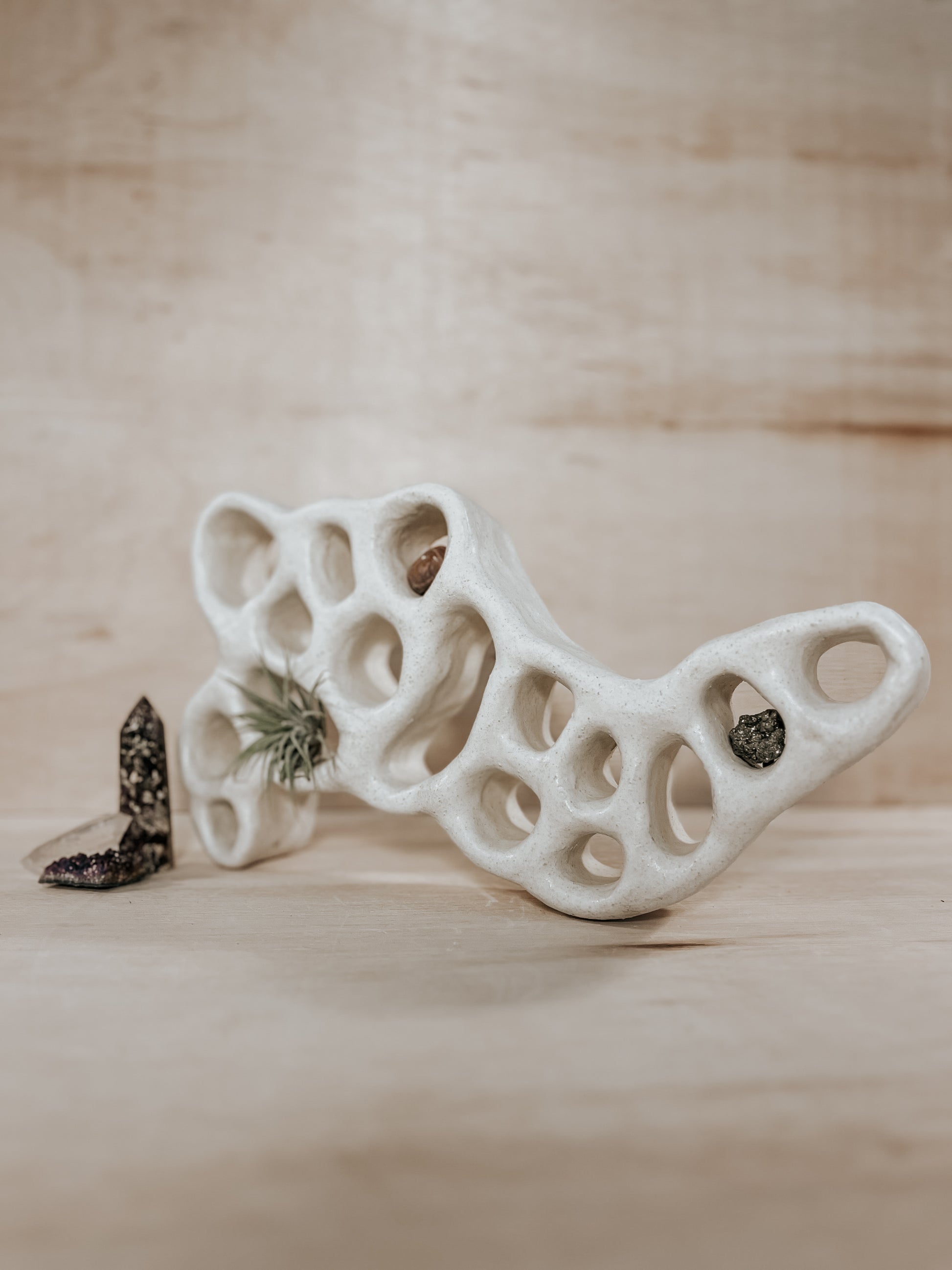 Hand-built ceramic altar with matte glaze, wall-mounted, soft curves, handmade in Boulder